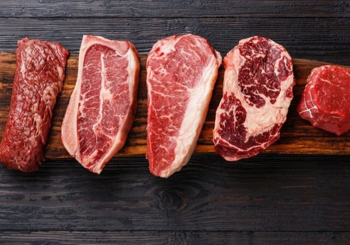slices of red meat laid on a table